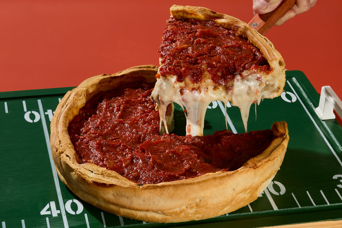 Da Pizza — lifted slice and melted cheese