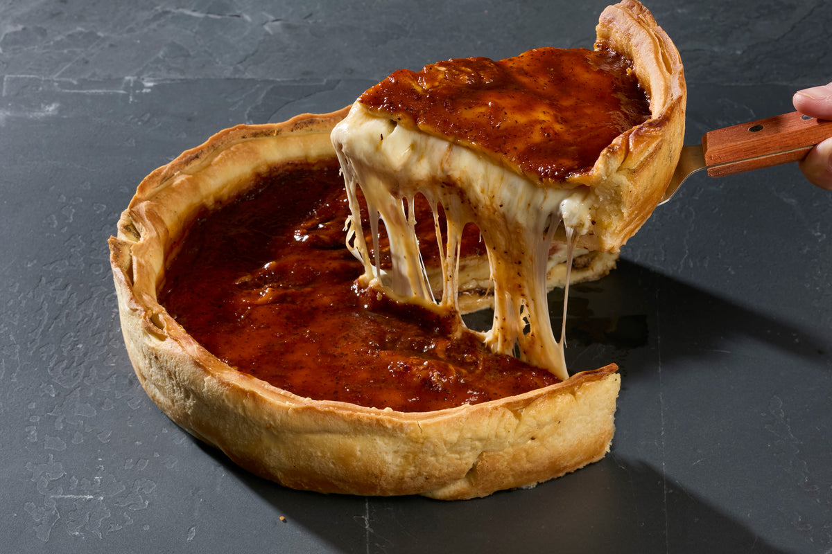 Pitmaster — lifted slice and melted cheese